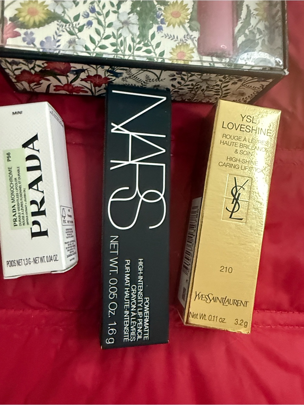 NARS High-Intensity Lip Color, YSL loveshine lipstick, Prada lipstick